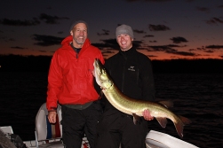 Dad's trophy musky, musky fishing at sunset, wisconsin musky fishing